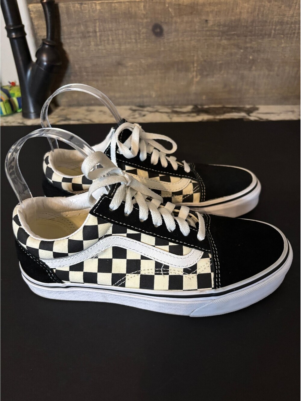 Vans black and white checkerboard low top sneakers